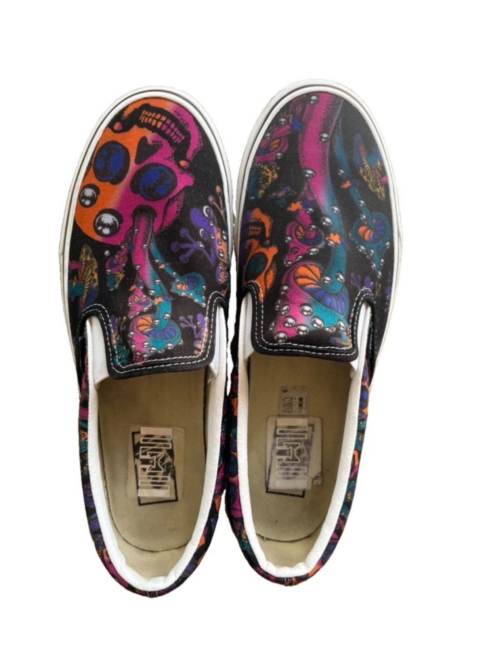 Vans Kids Slip-On Sneakers in Black with Purple, Pink, Blue & Orange Graphic